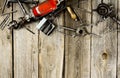 Drill with drills on a wooden background Royalty Free Stock Photo