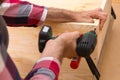 Drill driver whit screw on wooden background Royalty Free Stock Photo