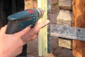 Drill in men hand. Build house