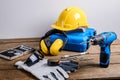 Drill and set of drill,tools,carpenter and safety, Protection Equipment Royalty Free Stock Photo