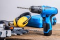 Drill and set of drill,tools,carpenter and safety, Protection Equipment Royalty Free Stock Photo