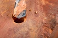 Drilling a hole in a clay brick. Carbide drill and red brick