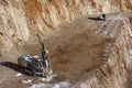 Drilling holes for demolition in a quarry Royalty Free Stock Photo