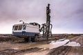 Drilling machine in a construction site with mud Royalty Free Stock Photo