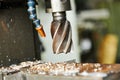 Drilling process of metal on machine tool Royalty Free Stock Photo