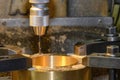 The drilling process on NC milling machine with brass material Royalty Free Stock Photo
