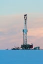 Drilling rig at dawn in winter Royalty Free Stock Photo