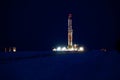 Drilling rig at night Royalty Free Stock Photo