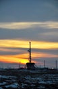 The drilling rig during sunset