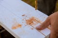 Drilling wooden plank with hand drill, close up Royalty Free Stock Photo