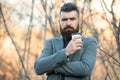 Drink it on the go. Man bearded hipster prefer coffee take away. Businessman drink coffee outdoors. Reloading energy Royalty Free Stock Photo