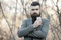 Drink it on the go. Man bearded hipster prefer coffee take away. Businessman drink coffee outdoors. Reloading energy Royalty Free Stock Photo