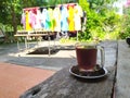 Drink hot black coffee espresso in the garden at home, Lop Buri, Thailand. In the morning, feeling fresh, clear