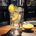 Drink with ice and a lemon slice standing on a bar table Royalty Free Stock Photo