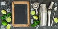 Drink making tools ingredients Lime mint blackboard Royalty Free Stock Photo