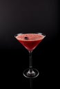 Drink in Martini Glass, Red Slush Ice summer drink with cherry on top Royalty Free Stock Photo