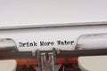 Drink More Water word typed on a Vintage Typewriter