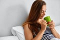 Drink Morning Tea. Woman Drinking Beverage In Bed. Healthy Lifestyle Royalty Free Stock Photo
