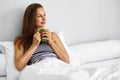 Drink Morning Tea. Woman Drinking Beverage In Bed. Healthy Lifesyle