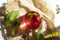 Drink with raspberries sweet leaves antioxidant beverage on a light background summerrefreshing