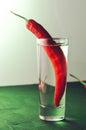 Drink set with shot of vodka and red pepper/ Drink set with shot of vodka and red pepper. Selective focus Royalty Free Stock Photo