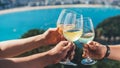 Drink three glasses white wine in friends hands outdoor seascape holidays, romantic couple toast with alcohol, happy people cheer Royalty Free Stock Photo