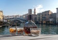 Drink for two in Venice - two glasses of lying liqueur and a bottle