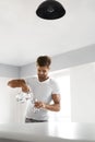 Drink Water. Close Up Man Pouring Water Into Glass. Hydration Royalty Free Stock Photo