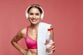 Drink Water. Sport Woman In Headphones With Bottle In Hands Royalty Free Stock Photo