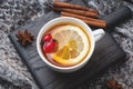 Drink from wild rose berries with lemon and honey cinnamon. Vitamin useful decoction of rose hips. cozy home concept of winter