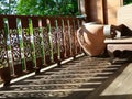 Drinking Clay water jar on wooden floor terrace Royalty Free Stock Photo