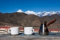 Drinking coffee with stunning mountain view. Royalty Free Stock Photo