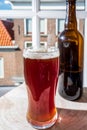 Drinking dark beer with view on street in old Zierikzee town, Zeeland, Netherland