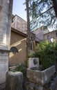 Drinking fountain with a lion head in a courtyard in Rome