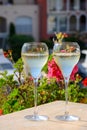 Drinking of French brut champagne sparkling wine in glasses, club party in yacht harbour of Port Grimaud near Saint-Tropez, French Royalty Free Stock Photo