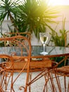 Drinking a glass of white wine on retro style rusty metal table