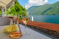 drinking rose wine in Lugano lakefront
