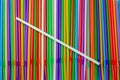 Drinking straws. Abstract background with many multi colored plastic tubules for juice or cocktail, single-use disposable. Top