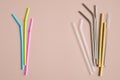 Drinking straws comparison concept. Single-use plastic straws vs different reusable drinking straws made of stainless steel metal