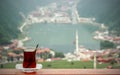 Drinking tea across lake Uzungol / Trabzon in Turkey