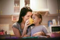 Drinking tea with mom is fun. Little girl. Royalty Free Stock Photo