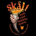 Drinking Viking Horn. Scandinavian drinking Viking horn with beer and Scandinavian phrase used as a toast - Skal