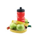 Drinking water bottle and apples Royalty Free Stock Photo