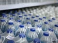 Packs of Bottled Drinking Water for Sale at Supermarket