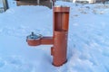 Drinking water fountain for children and adults at a recreational park in winter Royalty Free Stock Photo