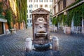 Drinking water fountain in a Roman street close to the Vatican Royalty Free Stock Photo