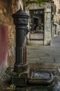 A drinking water fountain in Venice early in a summer morning Royalty Free Stock Photo