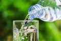 Drinking water poured into the glass and sunlight Royalty Free Stock Photo