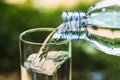 Drinking water poured into the glass and sunlight Royalty Free Stock Photo