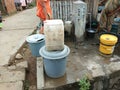 Drinking water in the village of Tanjung Durian